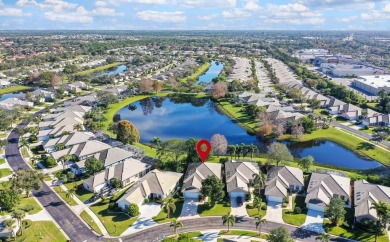 Relax looking out of this wide lake view in this freshly painted on St. Lucie Trail Golf Club in Florida - for sale on GolfHomes.com, golf home, golf lot