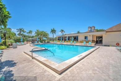 WELCOME TO 5628 PLEASANT VALLEY LANE -- A SERENE RETREAT NESTLED on Boca Delray Golf and Country Club in Florida - for sale on GolfHomes.com, golf home, golf lot