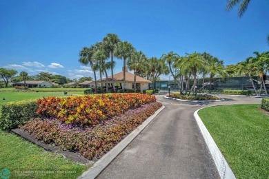 WELCOME TO 5628 PLEASANT VALLEY LANE -- A SERENE RETREAT NESTLED on Boca Delray Golf and Country Club in Florida - for sale on GolfHomes.com, golf home, golf lot