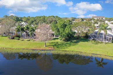 Relax looking out of this wide lake view in this freshly painted on St. Lucie Trail Golf Club in Florida - for sale on GolfHomes.com, golf home, golf lot