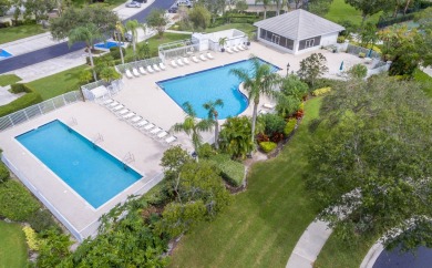 Relax looking out of this wide lake view in this freshly painted on St. Lucie Trail Golf Club in Florida - for sale on GolfHomes.com, golf home, golf lot