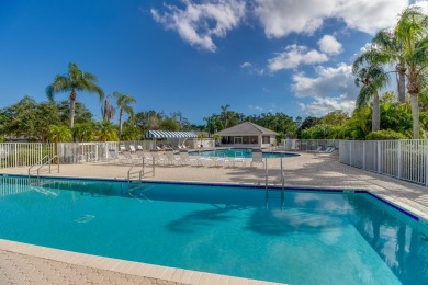 Relax looking out of this wide lake view in this freshly painted on St. Lucie Trail Golf Club in Florida - for sale on GolfHomes.com, golf home, golf lot