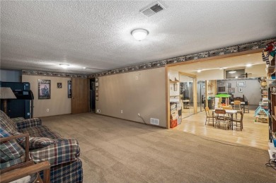 A 4-bedroom, 3 bath, 2-story with an 18x36 in-ground swimming on Bunker Hills Golf Course in Minnesota - for sale on GolfHomes.com, golf home, golf lot