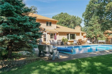 A 4-bedroom, 3 bath, 2-story with an 18x36 in-ground swimming on Bunker Hills Golf Course in Minnesota - for sale on GolfHomes.com, golf home, golf lot