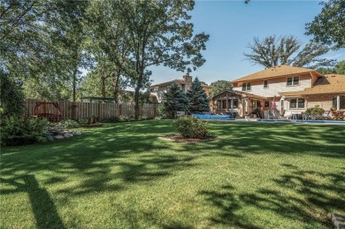 A 4-bedroom, 3 bath, 2-story with an 18x36 in-ground swimming on Bunker Hills Golf Course in Minnesota - for sale on GolfHomes.com, golf home, golf lot