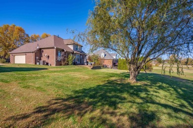 This charming 4-bedroom brick home offers a fantastic on Players Club of Henderson in Kentucky - for sale on GolfHomes.com, golf home, golf lot