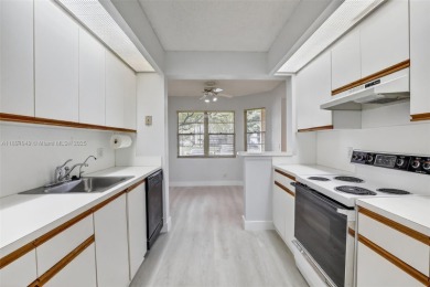 Freshly painted and newly floored ground-floor 2-bedroom on Flamingo Lakes Country Club in Florida - for sale on GolfHomes.com, golf home, golf lot