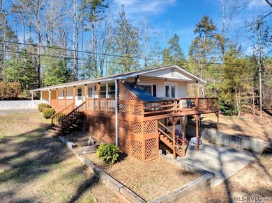 A renovated ranch on the shores of Poplar Creek. Privacy awaits on Tanglewood Shores Golf Club in Virginia - for sale on GolfHomes.com, golf home, golf lot