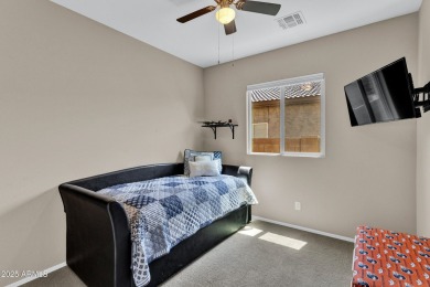 This wonderful single-story residence offers 3 spacious bedrooms on The Golf Club At Johnson Ranch in Arizona - for sale on GolfHomes.com, golf home, golf lot