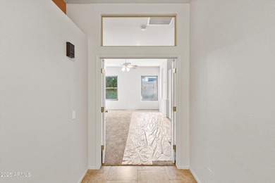 Step into this warm and welcoming, meticulously maintained home on Estrella Mountain Ranch Golf Course in Arizona - for sale on GolfHomes.com, golf home, golf lot