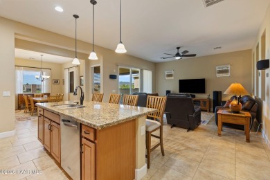 Stunning residence located in Quailwood, featuring a golf course on Quail Wood Greens Golf Course in Arizona - for sale on GolfHomes.com, golf home, golf lot