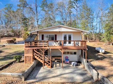 A renovated ranch on the shores of Poplar Creek. Privacy awaits on Tanglewood Shores Golf Club in Virginia - for sale on GolfHomes.com, golf home, golf lot