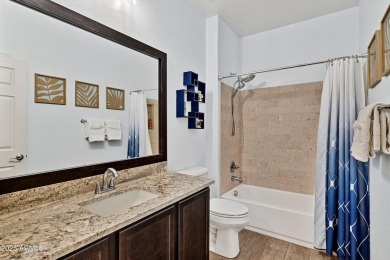 This wonderful single-story residence offers 3 spacious bedrooms on The Golf Club At Johnson Ranch in Arizona - for sale on GolfHomes.com, golf home, golf lot