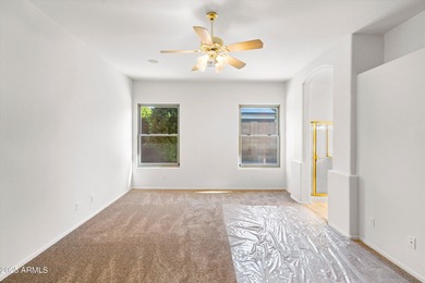 Step into this warm and welcoming, meticulously maintained home on Estrella Mountain Ranch Golf Course in Arizona - for sale on GolfHomes.com, golf home, golf lot