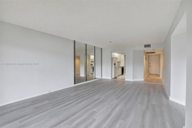 Freshly painted and newly floored ground-floor 2-bedroom on Flamingo Lakes Country Club in Florida - for sale on GolfHomes.com, golf home, golf lot