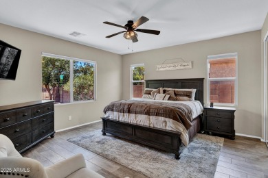 This wonderful single-story residence offers 3 spacious bedrooms on The Golf Club At Johnson Ranch in Arizona - for sale on GolfHomes.com, golf home, golf lot