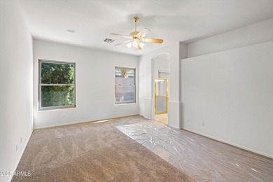 Step into this warm and welcoming, meticulously maintained home on Estrella Mountain Ranch Golf Course in Arizona - for sale on GolfHomes.com, golf home, golf lot