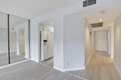 Freshly painted and newly floored ground-floor 2-bedroom on Flamingo Lakes Country Club in Florida - for sale on GolfHomes.com, golf home, golf lot