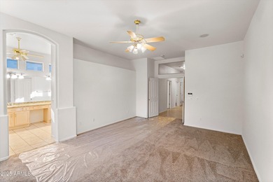 Step into this warm and welcoming, meticulously maintained home on Estrella Mountain Ranch Golf Course in Arizona - for sale on GolfHomes.com, golf home, golf lot