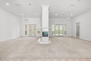 Located in the sought-after Queen's Harbor Yacht & Country Club on Queens Harbour Yacht and Country Club in Florida - for sale on GolfHomes.com, golf home, golf lot