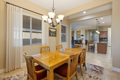 Stunning residence located in Quailwood, featuring a golf course on Quail Wood Greens Golf Course in Arizona - for sale on GolfHomes.com, golf home, golf lot