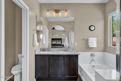 This wonderful single-story residence offers 3 spacious bedrooms on The Golf Club At Johnson Ranch in Arizona - for sale on GolfHomes.com, golf home, golf lot
