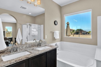 This wonderful single-story residence offers 3 spacious bedrooms on The Golf Club At Johnson Ranch in Arizona - for sale on GolfHomes.com, golf home, golf lot