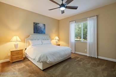 Stunning residence located in Quailwood, featuring a golf course on Quail Wood Greens Golf Course in Arizona - for sale on GolfHomes.com, golf home, golf lot