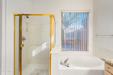 Step into this warm and welcoming, meticulously maintained home on Estrella Mountain Ranch Golf Course in Arizona - for sale on GolfHomes.com, golf home, golf lot