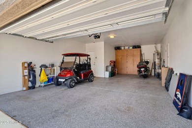 This wonderful single-story residence offers 3 spacious bedrooms on The Golf Club At Johnson Ranch in Arizona - for sale on GolfHomes.com, golf home, golf lot