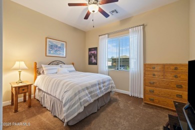 Stunning residence located in Quailwood, featuring a golf course on Quail Wood Greens Golf Course in Arizona - for sale on GolfHomes.com, golf home, golf lot