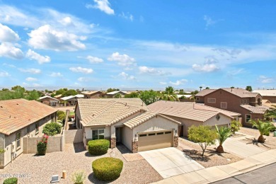 This wonderful single-story residence offers 3 spacious bedrooms on The Golf Club At Johnson Ranch in Arizona - for sale on GolfHomes.com, golf home, golf lot