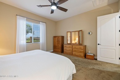 Stunning residence located in Quailwood, featuring a golf course on Quail Wood Greens Golf Course in Arizona - for sale on GolfHomes.com, golf home, golf lot