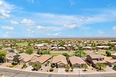 This wonderful single-story residence offers 3 spacious bedrooms on The Golf Club At Johnson Ranch in Arizona - for sale on GolfHomes.com, golf home, golf lot