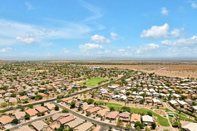 This wonderful single-story residence offers 3 spacious bedrooms on The Golf Club At Johnson Ranch in Arizona - for sale on GolfHomes.com, golf home, golf lot