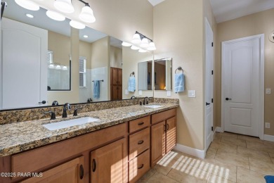 Stunning residence located in Quailwood, featuring a golf course on Quail Wood Greens Golf Course in Arizona - for sale on GolfHomes.com, golf home, golf lot
