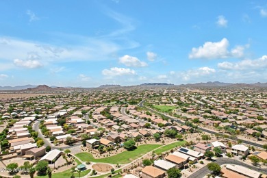 This wonderful single-story residence offers 3 spacious bedrooms on The Golf Club At Johnson Ranch in Arizona - for sale on GolfHomes.com, golf home, golf lot