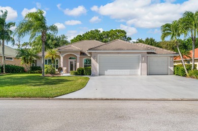 Spacious 4 bedroom, 3 bath home with 3 car garage in Country on St. Lucie Trail Golf Club in Florida - for sale on GolfHomes.com, golf home, golf lot