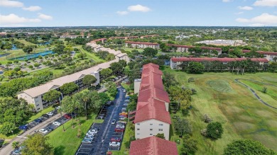 Freshly painted and newly floored ground-floor 2-bedroom on Flamingo Lakes Country Club in Florida - for sale on GolfHomes.com, golf home, golf lot