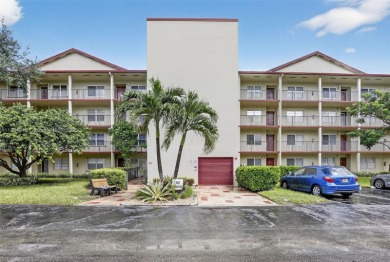 Freshly painted and newly floored ground-floor 2-bedroom on Flamingo Lakes Country Club in Florida - for sale on GolfHomes.com, golf home, golf lot
