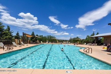 Stunning residence located in Quailwood, featuring a premium on Quail Wood Greens Golf Course in Arizona - for sale on GolfHomes.com, golf home, golf lot