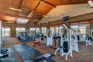 Stunning residence located in Quailwood, featuring a premium on Quail Wood Greens Golf Course in Arizona - for sale on GolfHomes.com, golf home, golf lot