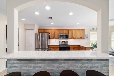 Welcome to paradise in this stunning Melbourne model, perfectly on Summerglen Country Club in Florida - for sale on GolfHomes.com, golf home, golf lot