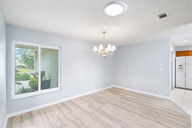 UPGRADED HOME for a GREAT PRICE on a CORNER LOT in a GOLF-CART on Falcon Watch Golf Club in Florida - for sale on GolfHomes.com, golf home, golf lot