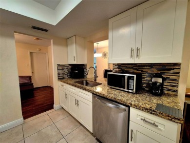 THIS HOME IS THE LARGEST MODEL BUILT IN THE COMMUNITY. IT CAN BE on Oriole Golf and Tennis Club in Florida - for sale on GolfHomes.com, golf home, golf lot