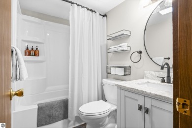 This is a sharp two-bedroom condominium located within 500 feet on Schuss Mountain Golf Club in Michigan - for sale on GolfHomes.com, golf home, golf lot