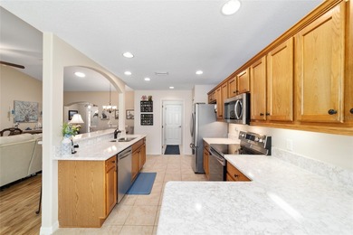 Welcome to paradise in this stunning Melbourne model, perfectly on Summerglen Country Club in Florida - for sale on GolfHomes.com, golf home, golf lot