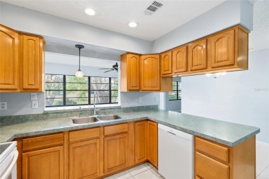 UPGRADED HOME for a GREAT PRICE on a CORNER LOT in a GOLF-CART on Falcon Watch Golf Club in Florida - for sale on GolfHomes.com, golf home, golf lot