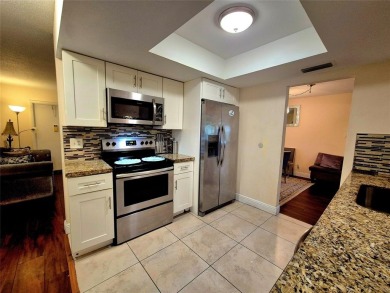 THIS HOME IS THE LARGEST MODEL BUILT IN THE COMMUNITY. IT CAN BE on Oriole Golf and Tennis Club in Florida - for sale on GolfHomes.com, golf home, golf lot