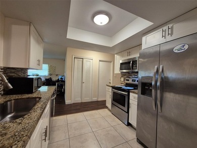 THIS HOME IS THE LARGEST MODEL BUILT IN THE COMMUNITY. IT CAN BE on Oriole Golf and Tennis Club in Florida - for sale on GolfHomes.com, golf home, golf lot